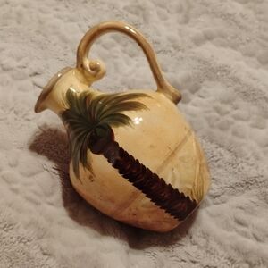 Elegant Ceramic Pitcher with Palm Tree Design